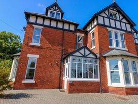 An exterior view of a house with a pathway at Fern Lee in Carlisle