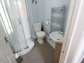 A bathroom with shower, toilet, and sink at Fern Lee in Carlisle