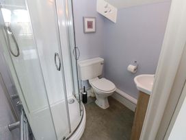 A bathroom with a shower, toilet, and sink at Fern Lee in Carlisle