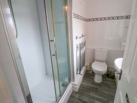 A bathroom with a shower and toilet at Fern Lee in Carlisle