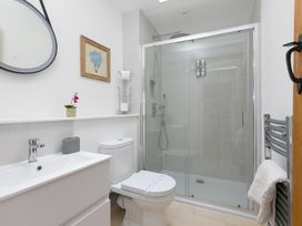 A bathroom with a shower and sink at Carines Barns - Pen in Cubert