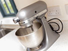 A kitchen mixer on a counter at Carines Barns - Wesley Barn in Cubert