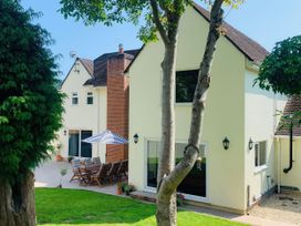 A house with a patio and garden at Brooklands in Uplyme