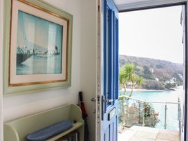 An entryway with a door to a coastal view at 2 Channel View Salcombe