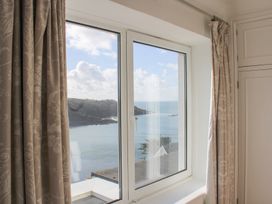 A window with a view of the ocean at 2 Channel View Salcombe