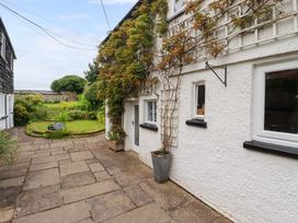 An outdoor area with a pathway and garden at Clematis House, St Columb Major
