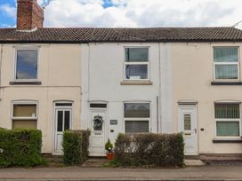 A house with windows and doors at Bluebell Cottage in Brayton