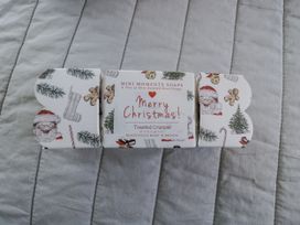 A trio of Christmas scented soaps in a decorative box at The Old Byre in Woodfalls