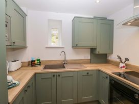 A kitchen with a sink and countertop at Riverside Cottage No 5 in Keswick