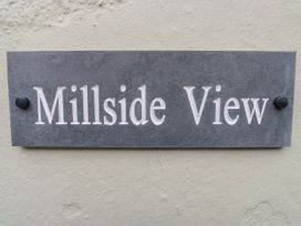 A nameplate with Millside View at Millside View