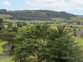 A view of hills and greenery at Millside View
