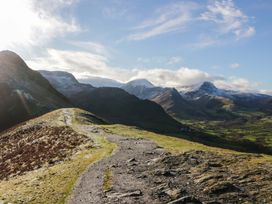 A mountain landscape with a path at Chestnut Timber Lodge in Keswick