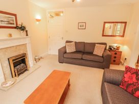 A living room with sofa and coffee table at Flat 17 in Keswick