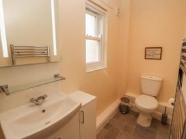 A bathroom with a sink and toilet at Flat 17 in Keswick
