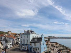 A view of Rock Point building near the coast at Jasper in Lyme Regis