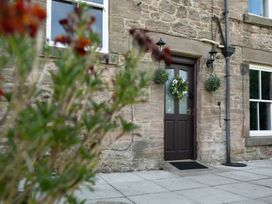 A front entrance with a door and window at Wonderland in Tweedmouth, Berwick-Upon-Tweed