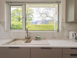 A kitchen sink and window view at Oaklea in Keswick