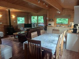 A living room with a table and chairs at 64 Acorn Lodge Kenwick Park Louth