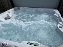 A hot tub with water at Riviere House in Hayle