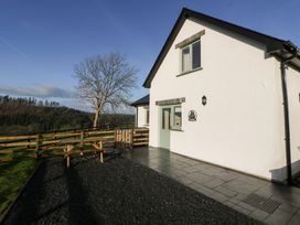 A house with a patio and fencing at Y Stabal near Llanilar