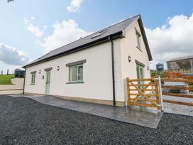 A house with a pathway and gate at Y Beudy near Llanilar