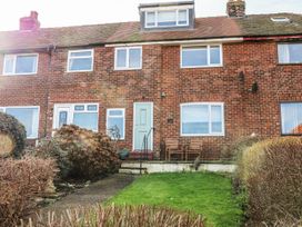 A house with a front door and garden at Whitby View in Whitby