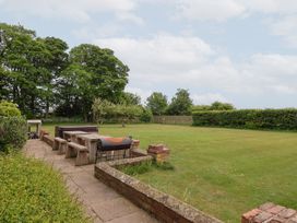 A garden with tables and chairs at The Grange in Flamborough