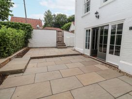 An outdoor area with a stone patio and steps at Syleham House Syleham near Eye