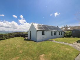 A house with solar panels and garden at Bwthyn Y Swnt Moelfre