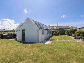 A house with solar panels and garden at Bwthyn Y Swnt in Moelfre