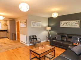 A living room with a sofa and coffee table at The Beach Retreat The Bay - Filey
