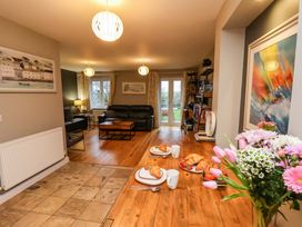 A dining room with a table and chairs at The Beach Retreat The Bay - Filey