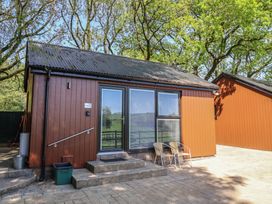 A cabin with a front door and steps at Jasmine in Bydown near Barnstaple