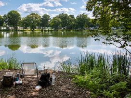 A fishing setup by a lake at Heron in Shobdon