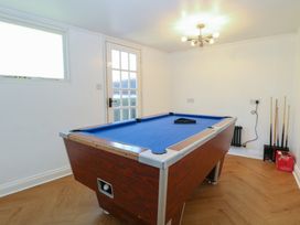 A game room with a pool table at Sunrise House in Pakefield near Lowestoft