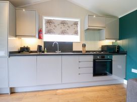 A kitchen with modern appliances at Hazel in Oakthorpe near Donisthorpe