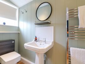 A bathroom with a sink and toilet at Hazel in Oakthorpe near Donisthorpe