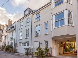 A building with multiple windows and a balcony at 14 Marine Parade Lyme Regis