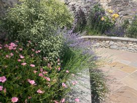A garden with flowers and lavender at Malabar House in Lyme Regis