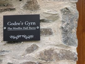 A sign reading Godre'r Gyrn at Plas Moelfre Hall Barns in Oswestry