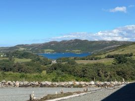A view of a lake and mountains at Drumore House, Laddan near Carrigart, County Donegal