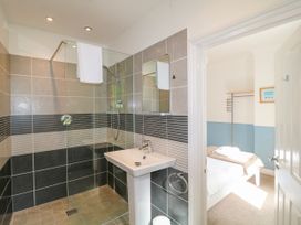 A bathroom with a shower and sink at Harbourside in Dartmouth