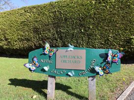 A sign with butterflies at Applejacks Orchard in Holywell