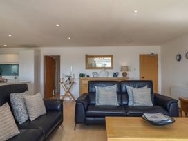 A living room with a sofa and coffee table at 4 Burgh Island Causeway in Bigbury