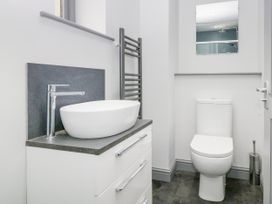 A bathroom with a sink and toilet at Fell View Cottage in Lambrigg near Kendal