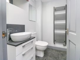 A bathroom with a sink and toilet at Fell View Cottage in Lambrigg near Kendal