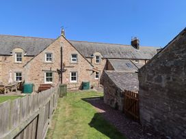 A garden with a building in view at Bruno's Bothy Middleton near Belford