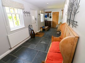 A hallway with a bench and coatrack at Glas y Dorlan Nevern near Newport, Pembrokeshire