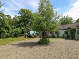 An outdoor area with a tree and gravel at Glas y Dorlan Nevern near Newport, Pembrokeshire