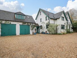 A house with a garage and gravel driveway at White House